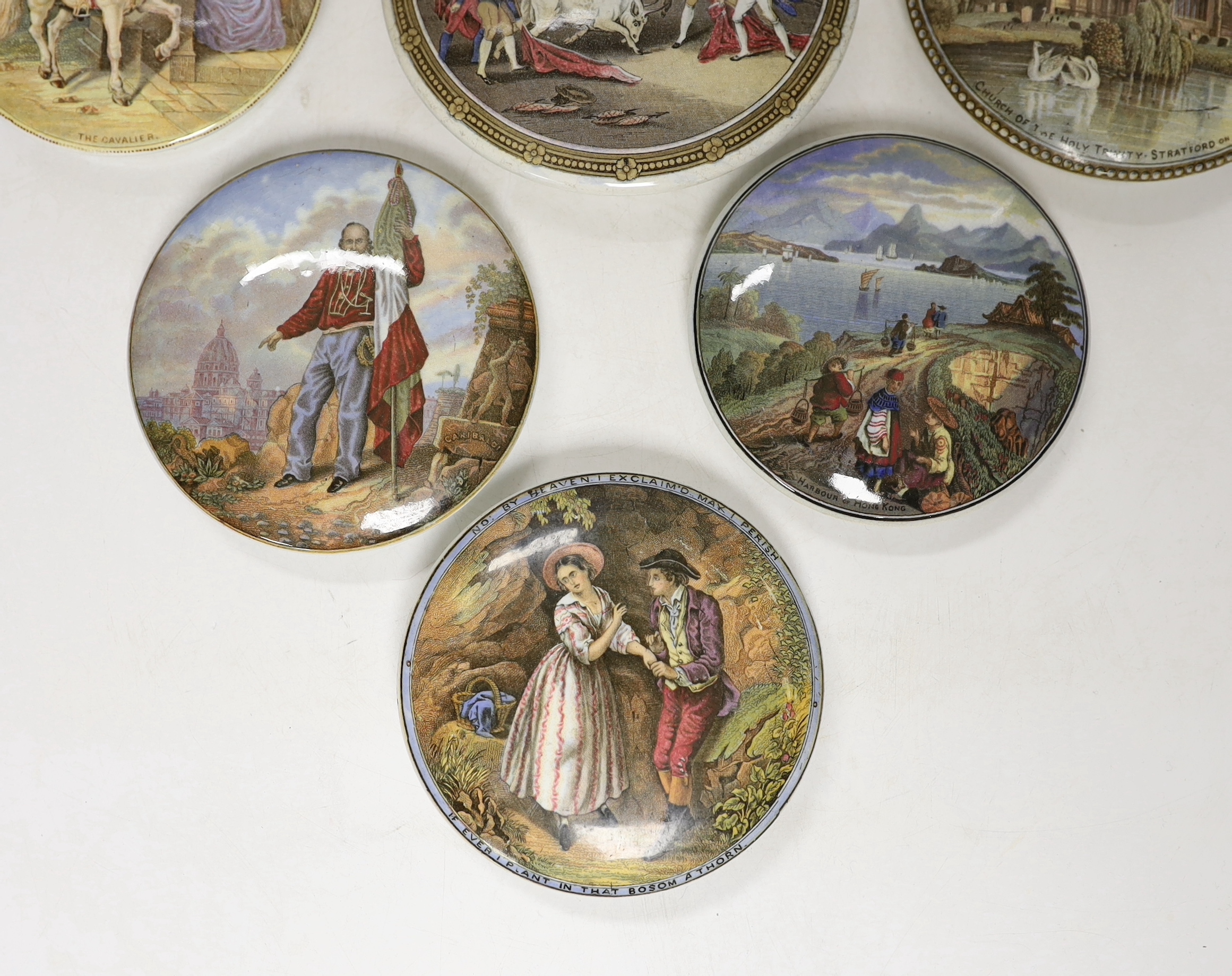 Eight Victorian ceramic Prattware pot lids, including ‘Alas Poor Bruin’ scene with bear, largest 13cm